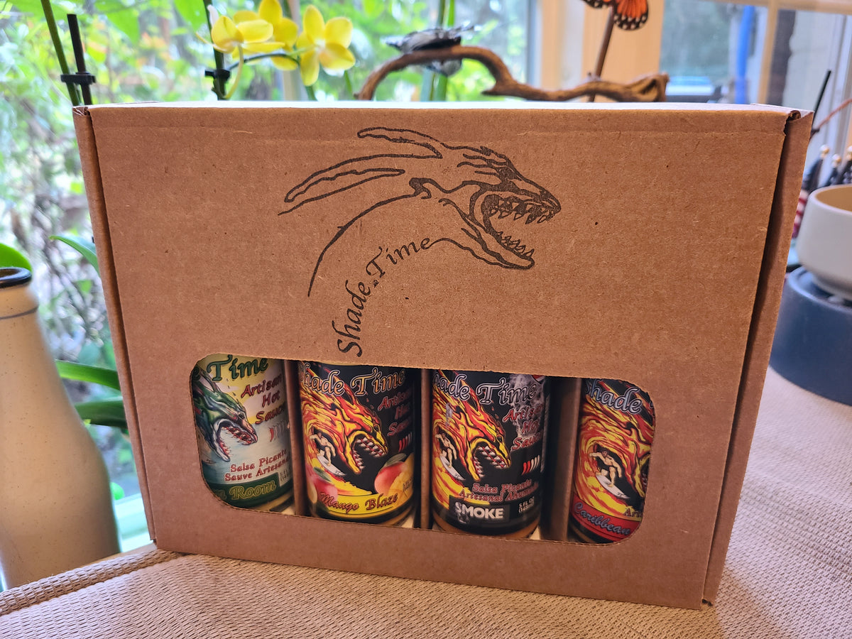 "Gift set of artisan hot sauces: mild, smoky, fruity, and curry-spiced"