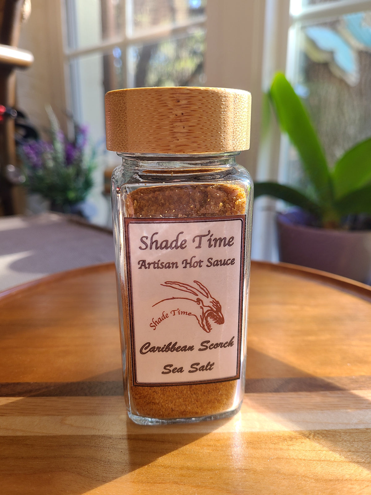 "Caribbean Scorch spicy sea salt with bamboo cap in 4 oz glass jar"