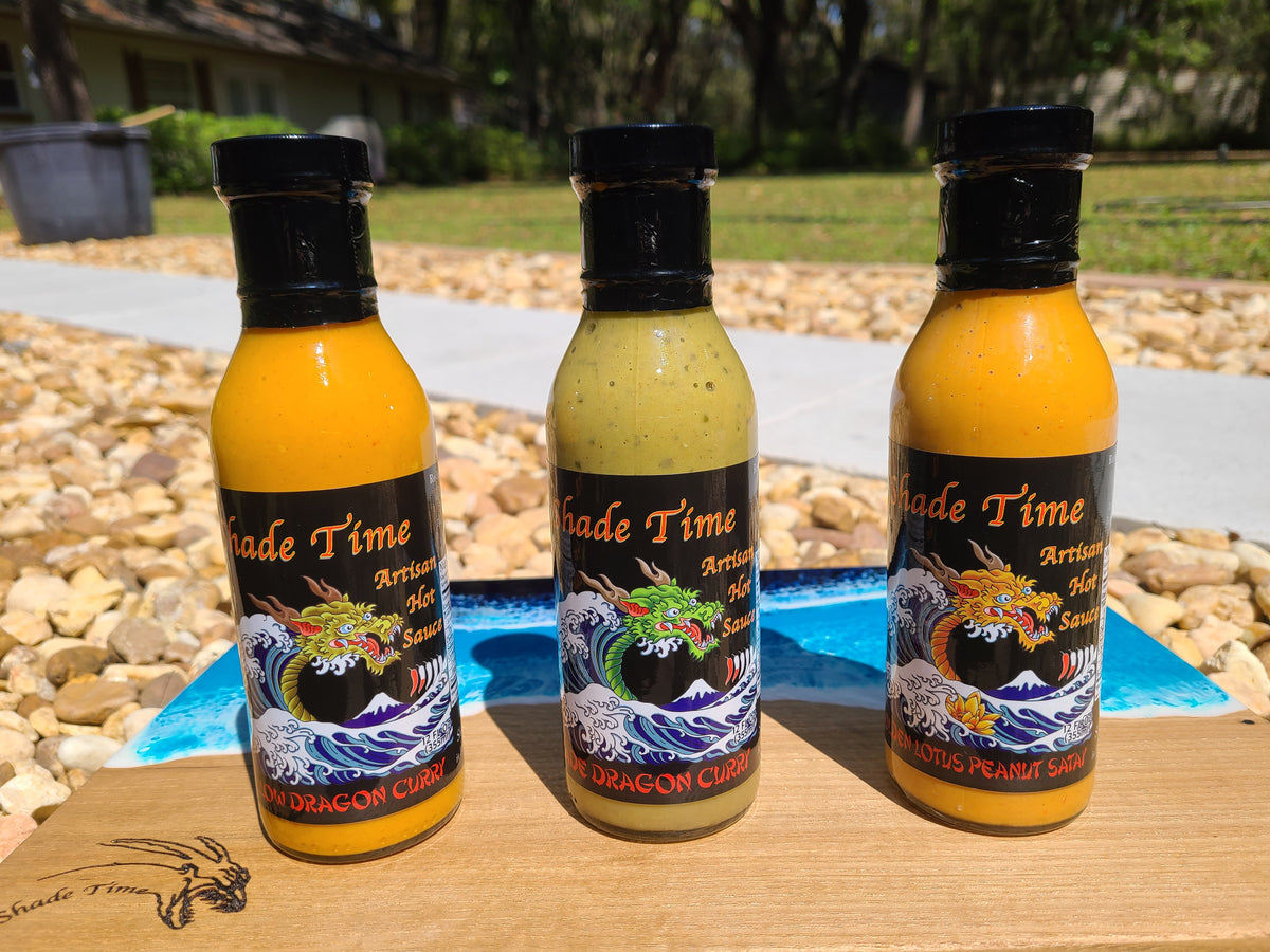 "Shade Time Thai 3-pack with green curry, yellow curry, and peanut satay sauces"
