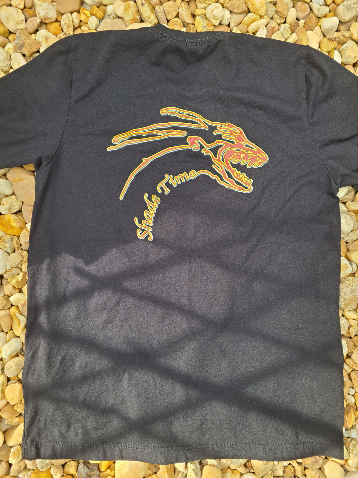 "Black Bella+Canvas hot sauce merch tee with Shade Time branding"