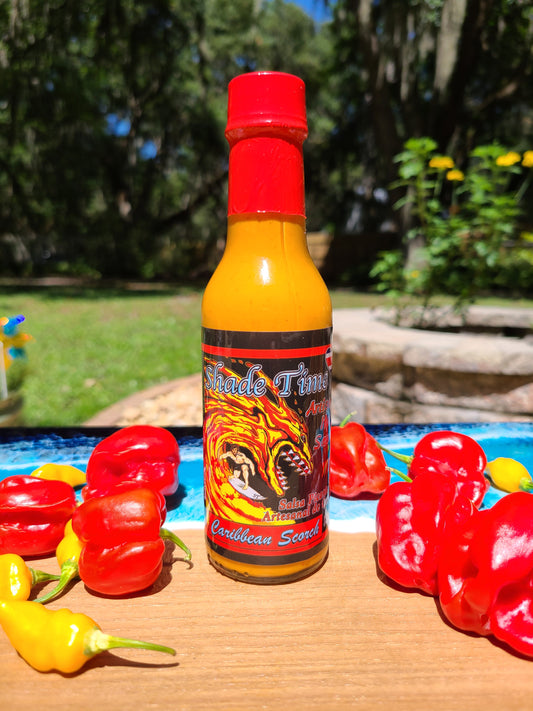 "Bottle of Caribbean Scorch hot sauce with curry spices and chiles"